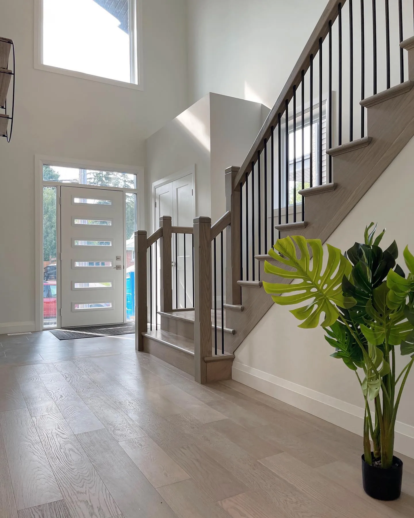 Front foyer in custom home build in Cambridge by Caliber Contracting
