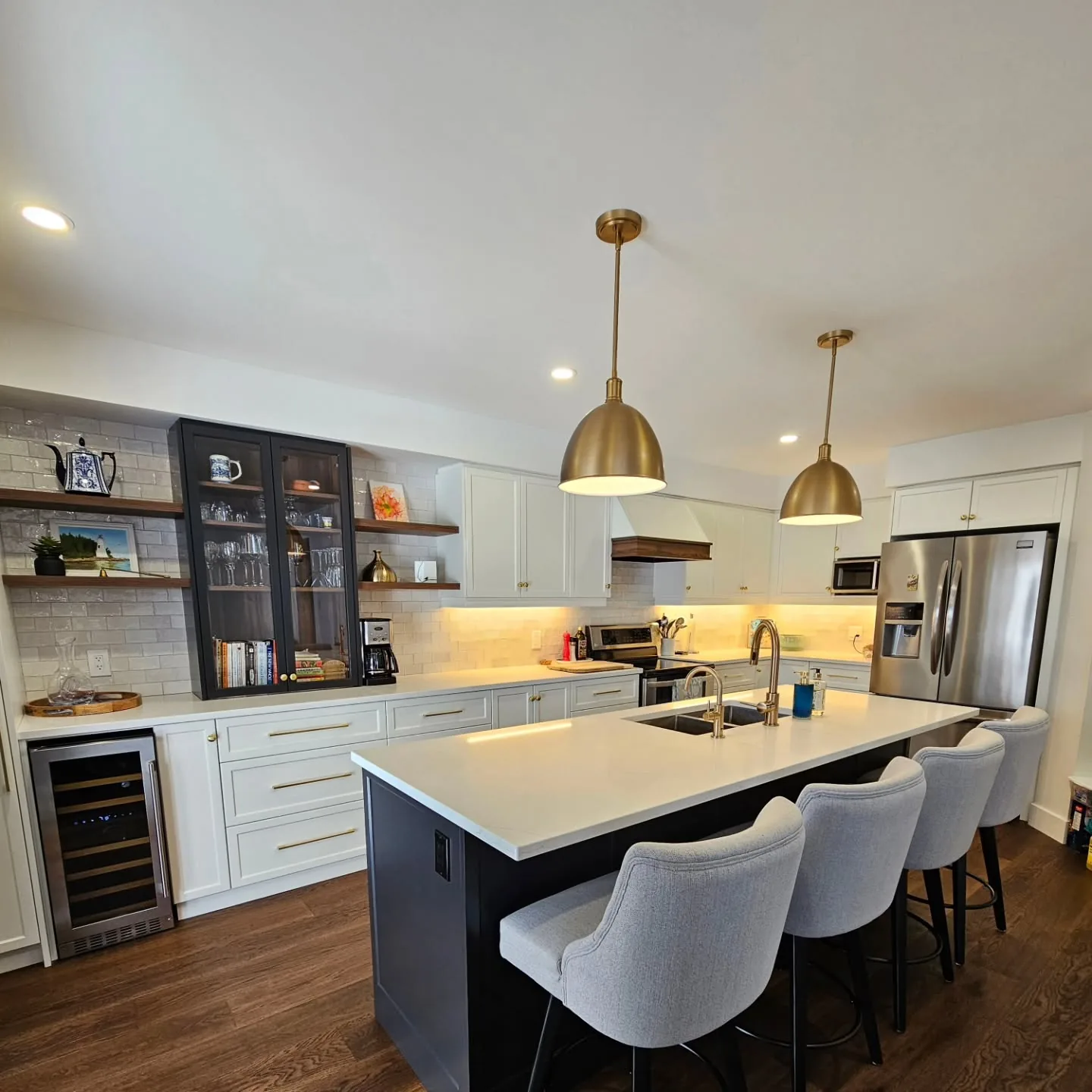 Custom kitchen with rustic wood range hood in Kiwanis Park, Kitchener
