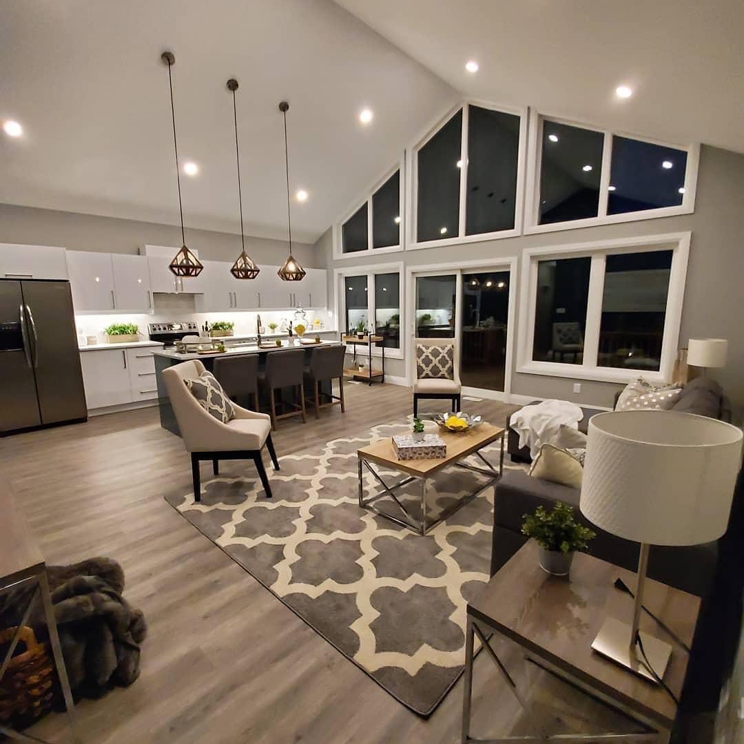 Open concept renovation with vaulted ceilings in Galt by Caliber Contracting