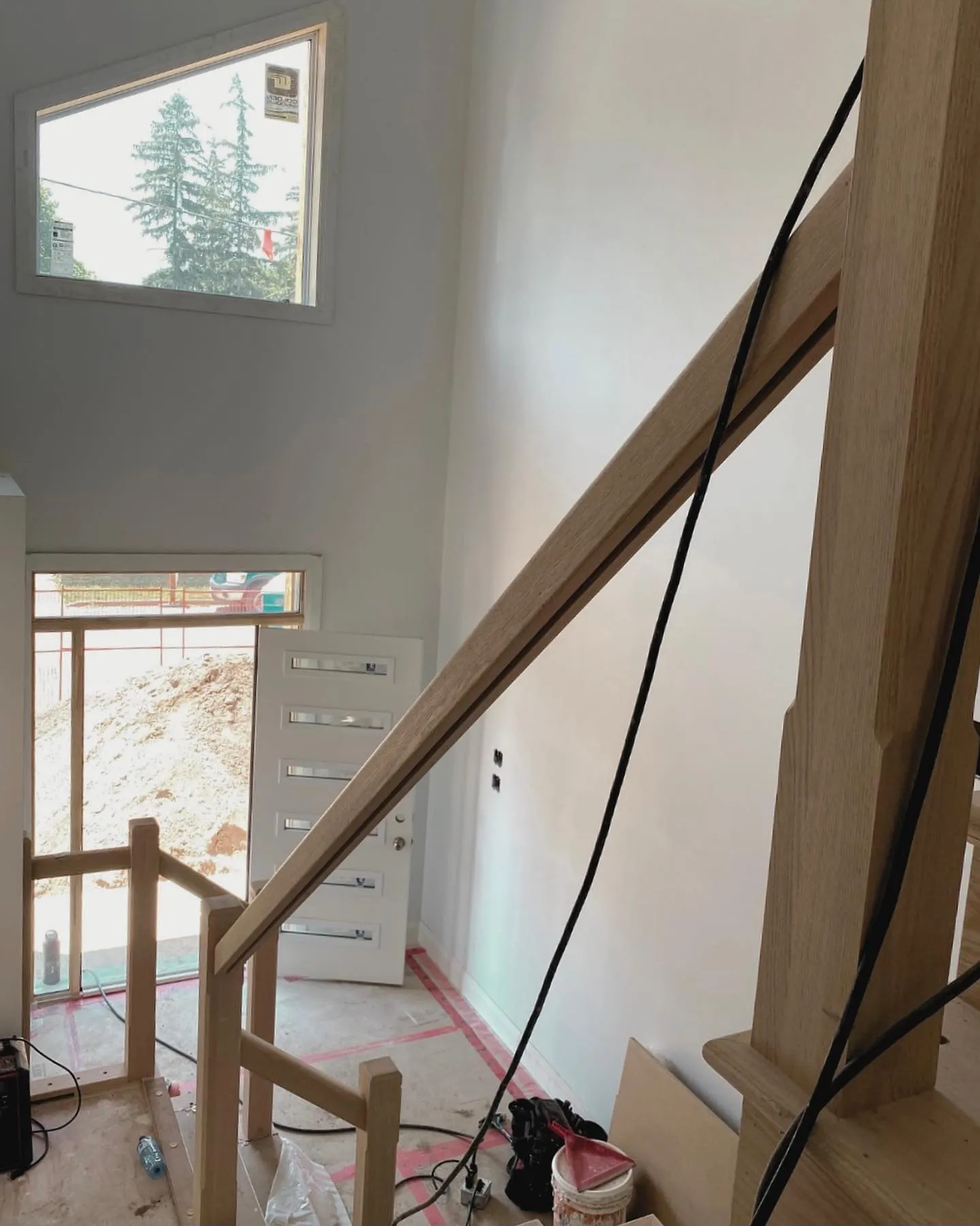 New staircase in custom home in Preston by Caliber Contracting