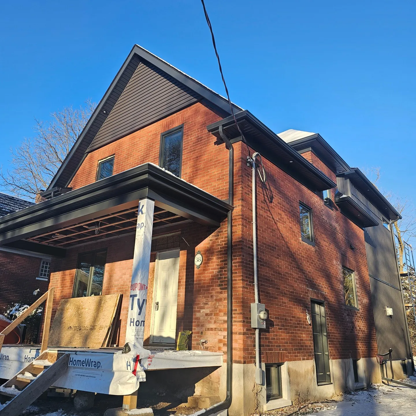 Whole house remodel and addition in progress in Westmount by Caliber Contracting